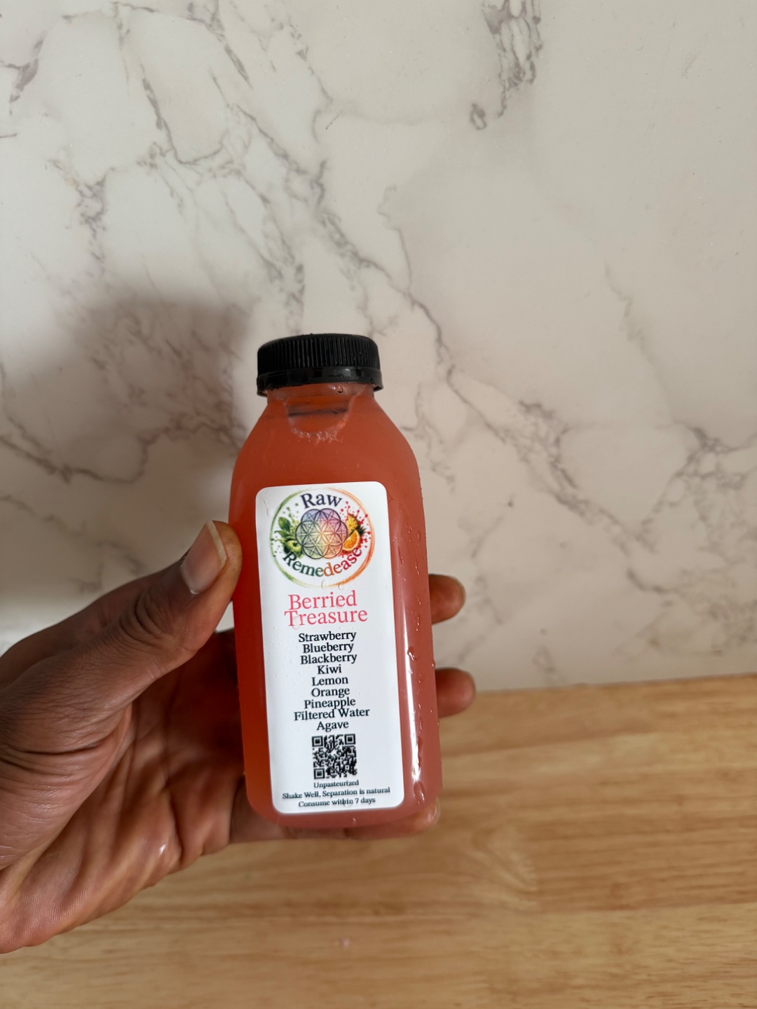 Berried Treasure juice — Strawberry, Blueberry, Blackberry, Kiwi, Lemon, Orange, Pineapple, Filtered Water, Agave
